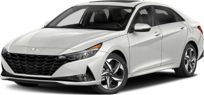 Front side view of a sedan with angular grille and alloy wheels