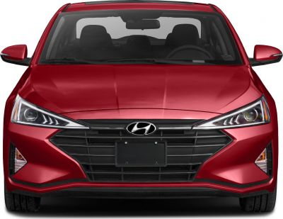 Sharp headlights and bold grille front view