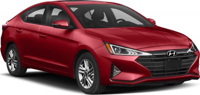 Front-side view featuring sharp headlights and bold grille design