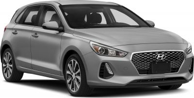 Front side view of hatchback with hexagonal grille and modern headlights