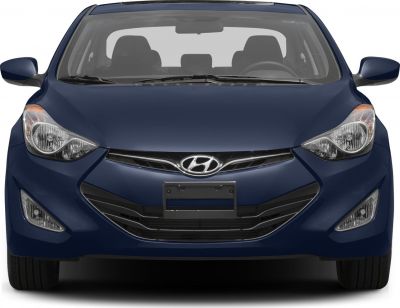 Front view of a 2013 coupe highlighting headlights and grille
