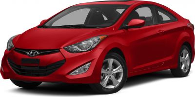 Aerodynamic compact coupe with sleek headlights and alloy wheels