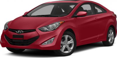 Front-side view of red compact coupe with headlight and alloy wheels