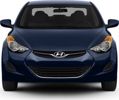 Front view with distinct headlamps and grille