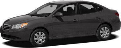 Gray compact sedan side profile with alloy wheels