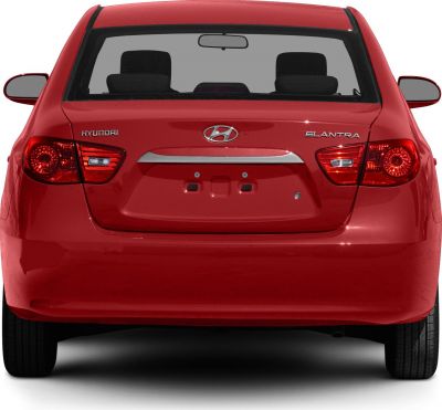 Rear view with rounded taillights and smooth trunk design
