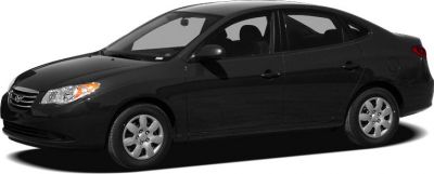 Side profile of a black sedan with alloy wheels and aerodynamic body.