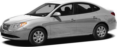 Side profile of a four-door sedan with alloy wheels and aerodynamic shape