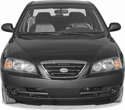 Front view showcasing headlights, grille, and bumper design.