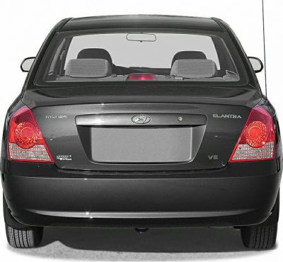 Rear view showing distinctive tail lights and trunk design with VE badge.