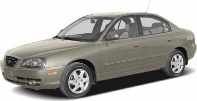 Front-side profile of a compact sedan with alloy wheels