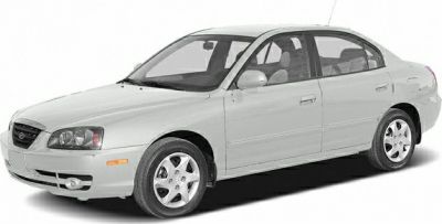 Front side view of a silver four-door sedan with alloy wheels