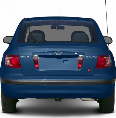 Rear view of blue hatchback with distinctive tail lights and rear window wiper