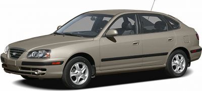 Beige hatchback with detailed side and front profile