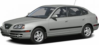Silver hatchback front and left side view with alloy wheels