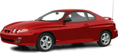 Red sports coupe with triple front headlights and sleek aerodynamic body.