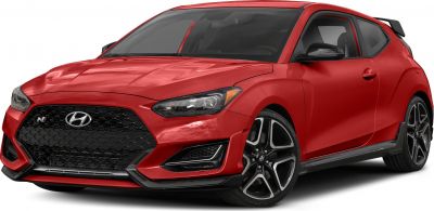 Red sporty hatchback with aggressive front grille and unique wheels