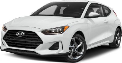 Front view with headlights and large hexagonal grille.