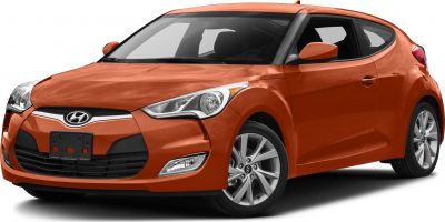 Orange compact hatchback with distinctive front grille and headlights