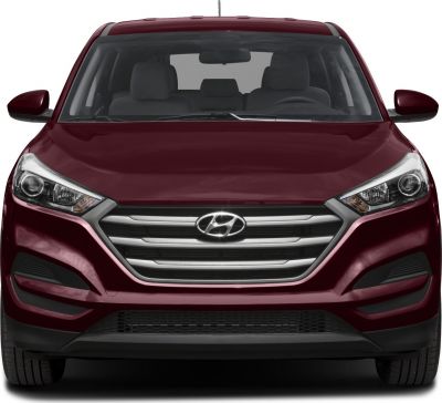 Front view showing grille and angular headlights of a modern SUV.