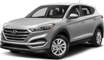 Front side view of silver SUV with modern alloy wheels