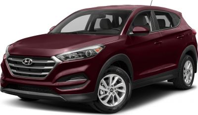 Front-side view of SUV with sleek headlights and alloy wheels