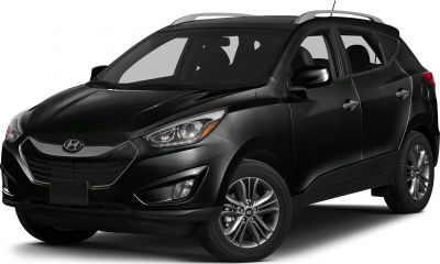 Front-side view of black SUV with sleek headlights and alloy wheels