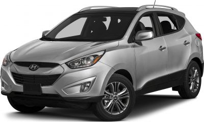 Front-side view of silver SUV with modern headlights and alloy wheels
