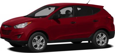Red compact SUV side profile with alloy wheels