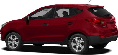Side profile and rear view of a mid-size SUV with alloy wheels and a rear spoiler