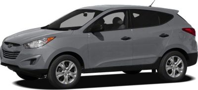 Side profile of a compact SUV with smooth contours and alloy wheels