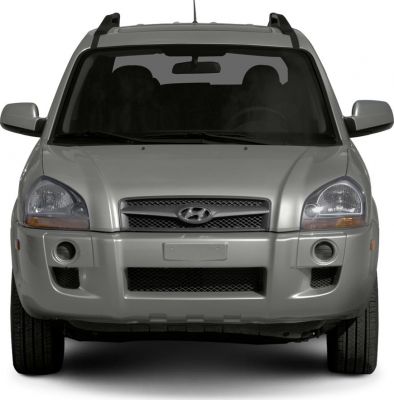 SUV front view with distinct grille, headlights, and roof rails
