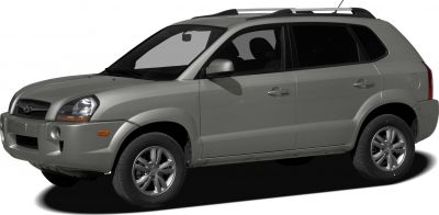 Front side profile of mid-size SUV with roof rack and alloy wheels