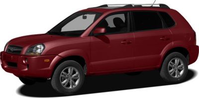 Side profile with alloy wheels and four doors of an SUV
