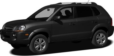 Side profile of a compact SUV with roof rails and alloy wheels