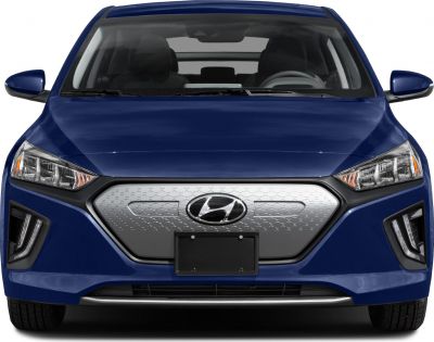Front view of electric car with closed grille and LED headlights