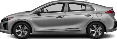 Side profile with aerodynamic shape, alloy wheels, and four doors