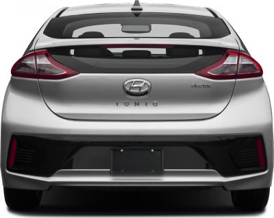 Rear view of hatchback with detailed taillights and badges
