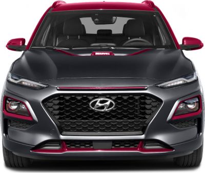 Front view with black hexagonal grille and sharp LED headlights