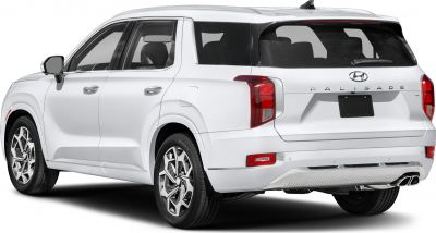 Rear and side view of a white SUV with distinctive tail lights and alloy wheels