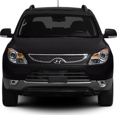 Front view with grille, headlights, and fog lamps