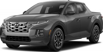 Front angled view of vehicle with distinctive grille and LED headlights