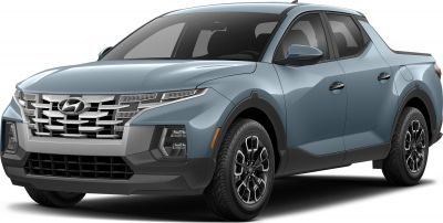 Front view with bold grille, LED headlights, and modern pickup design