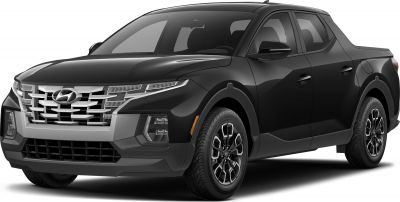 Black pickup truck with modern front grille and multi-spoke alloy wheels