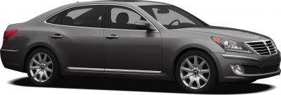 Luxury sedan side profile with chrome trim and multi-spoke alloy wheels