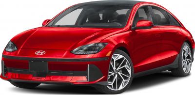 Sleek red electric sedan with LED headlights and modern alloy wheels