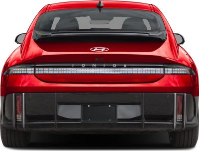 Rear LED light strip and aerodynamic diffuser of a sleek electric vehicle