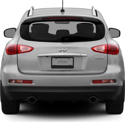 Rear view with tail lights, dual exhausts and rear window of SUV