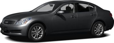 Front side view of a dark grey four-door sedan with alloy wheels.
