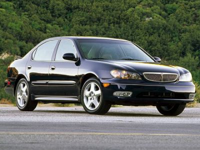 Black mid-size sedan front-side view with alloy wheels